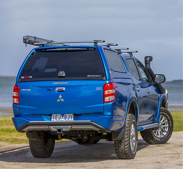 Бампер задний силовой с интегрированным фаркопом для Mitsubishi L200 (2006-2015)