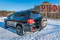 Бампер РИФ силовой задний Toyota Land Cruiser 200 2012-2015 с квадратом под фаркоп, калиткой, фонарями, подсветкой номера